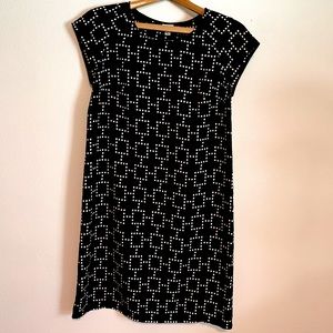 Merona brand, black knee length dress with white dotted pattern.